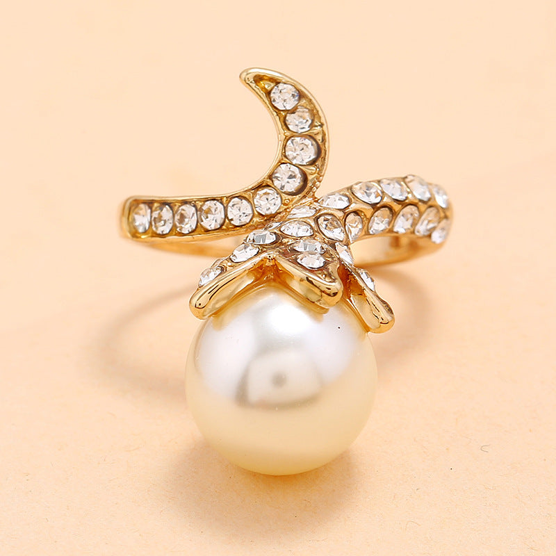 Bague perle fleur Moyyudé en métal doré avec cristaux brillants et perle blanche élégante