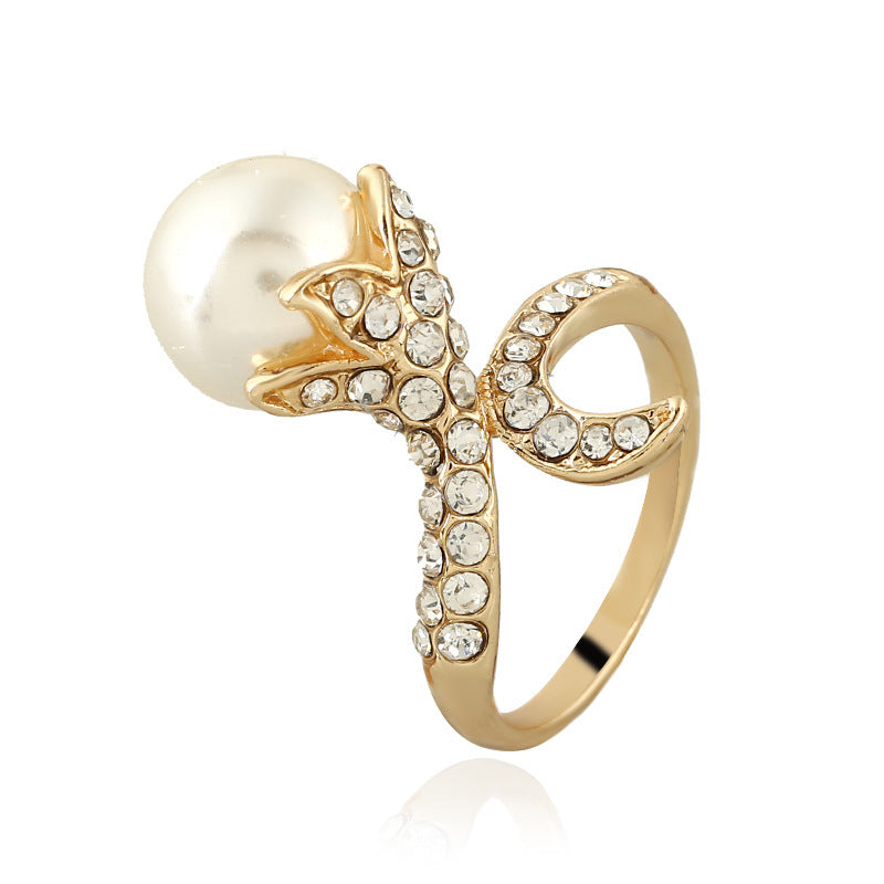 Bague perle fleur Moyyudé en métal doré avec cristaux décoratifs et perle blanche élégante