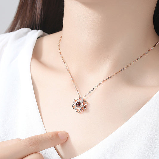 Collier femme Moyyudé avec pendentif fleur de cerisier en métal argenté délicat